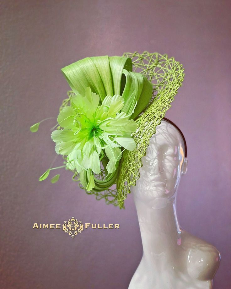 Handmade Silk and Paper Feathered Fascinator Structured crisscross woven material with apple green silk and matching feather burst. Easy-to-wear headband fascinator makes a statement, and can be worn to a myriad of events: Easter, bridal, derby, Del Mar races, hat contests, church, galas, Kentucky Derby, Melbourne Cup, high tea, weddings, cocktail parties, and more. Some customization available as this is made-to-order; please message with your requests to see if we can meet your needs.   *FREE SHIPPING  For more STATEMENT JEWELRY and HANDMADE HATS go to www.aimeesfuller.com Aimee Fuller has been a trusted online seller since 1999, and is excited to bring her creations back to Etsy.  Though often copied by hobbyists and even high-end department stores, discriminating fashionistas from all Fitted Sinamay Straw Hat With Curved Brim, Fitted Sinamay Boater Hat With Short Brim, Fitted Sinamay Brimmed Top Hat, Fitted Wide Brim Sinamay Top Hat, Spring Sinamay Fascinator, Fitted Green Costume Hats And Headpieces For Garden Party, Sinamay Fascinator Hat For Spring, Spring Sinamay Fascinator Hat, Fitted Top Hat With Curved Brim For Spring