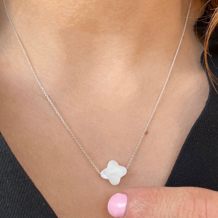 ✔️ Sterling silver 925 & mother of pearl gemstone ✔️ A Dainty Cross Necklace you will love!! ✝️ >>Handcrafted with love for you in GREECE!! >> MATERIAL This crucifix necklace is handmade with sterling Siver 925 Available with 22K Gold finish or rose gold finish >>SIZE Mother of pearl Cross: width >> 0.4 inches - 1.1 cm height >> 0.4 inches - 1.1 cm Chain: Chain length available options : 13-14-15 -16-17-18-19 inches (30-32-35-38-40 -42-45-48 -50 cm ) plus 1 inch White Sterling Silver Charm Necklace With Clavicle Chain, White Sterling Silver Clavicle Chain Charm Necklace, White Minimalist Necklace With Delicate Chain, White Modern Necklace With Adjustable Chain, Minimalist White Necklace For Gift, Modern White Jewelry With Delicate Chain, White Sterling Silver Charm Necklace With Flower Pendant, Simple White Clavicle Chain Charm Necklace, Minimalist White Sterling Silver Necklace