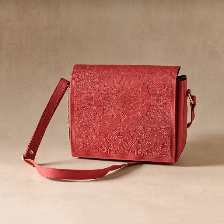 Kohra Embossed Leather Crossbody Bag - Ten Thousand Villages Embossed Crossbody Shoulder Bag For Everyday Use, Everyday Embossed Crossbody Shoulder Bag, Embossed Satchel Shoulder Bag For Travel, Travel Embossed Satchel Shoulder Bag, Embossed Rectangular Shoulder Bag For Travel, Rectangular Embossed Shoulder Bag For Travel, Embossed Rectangular Travel Shoulder Bag, Rectangular Embossed Travel Shoulder Bag, Formal Embossed Shoulder Bag