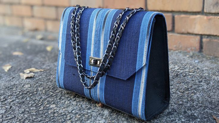 Illori Handmade Blue and Silver Striped African Handwoven Aso Oke Hand Bag-DPAHB23 Blue Woven Crossbody Shoulder Bag, Elegant Blue Woven Bag, Handmade Blue Shoulder Bag For Travel, Elegant Handmade Blue Shoulder Bag, Blue Handwoven Square Bag, Handwoven Blue Square Bag, Blue Square Handwoven Shoulder Bag, Blue Square Handwoven Bag, Blue Everyday Clutch Bag