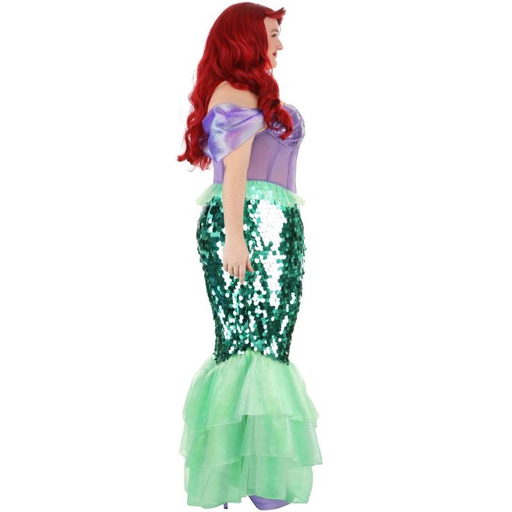 the little mermaid is dressed in green and purple