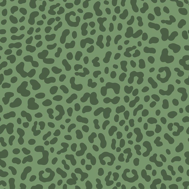 an animal print pattern in green with black spots on the bottom and top half of it