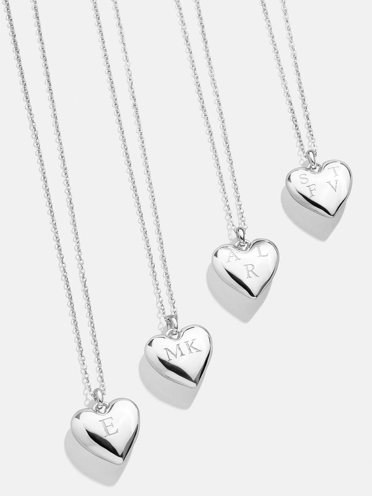 Design a special memento to represent those closest to your heart. The Puffy Heart Sterling Silver Custom Pendant Necklace features a three-dimensional heart charm with the option to add 1-4 engraved letters of your choosing. Add the initials of each of the members of your family, you and a few loved ones, or even just your own - the options are endless. Better yet, this piece is crafted with sterling silver, meaning it'll last you a lifetime. Valentine's Day Heart Cut Locket Necklace With Heart Charm, Valentine's Day Heart Shaped Locket Necklace With Charm, Heart Cut Locket Necklace With Heart Charm For Anniversary, Heart Cut Locket Necklace With Heart Charm As Gift, Mother's Day Heart Cut Locket Necklace With Heart Charm, Heart Cut Locket Necklace As A Gift, Anniversary Heart Cut Locket Necklace With Heart Charm, Valentine's Day Heart Pendant Necklace For Memorial, Open Heart Charm Necklace Keepsake