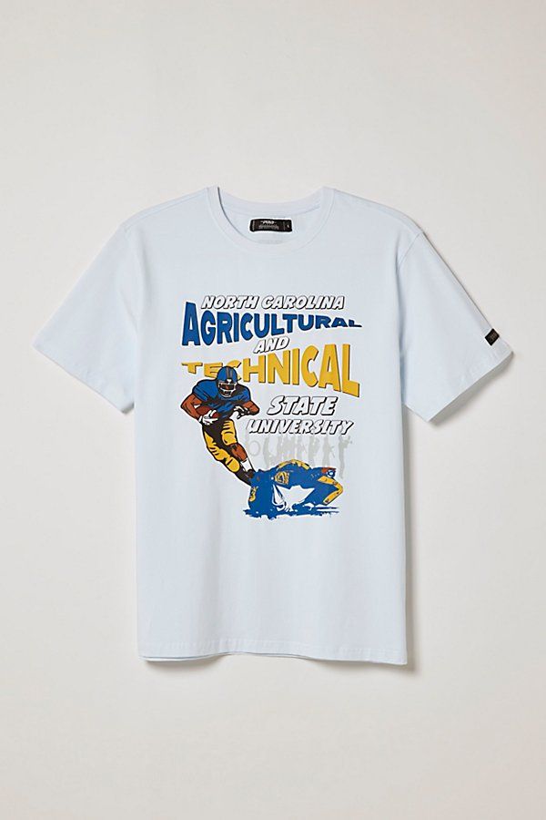 North Carolina A&T State University t-shirt from our exclusive UO Summer Class 2022 capsule collection. The UO Summer Class of 2022 was a 10-week internship for five students recognized for their academic and creative excellence, in collaboration with five Historically Black Colleges and Universities (HBCUs). From concept to creation, the students designed an exclusive UO capsule collection celebrating the culture and community of their schools through the lens of their Black Americana theme. Pr Collegiate Graphic Print Relaxed Fit Tops, Collegiate Tops With Graphic Print And Relaxed Fit, Urban Outfitters White Graphic T-shirt, Urban Outfitters White Graphic Print T-shirt, Urban Outfitters White T-shirt With Graphic Print, Urban Outfitters Graphic Tee With Text Print, Urban Outfitters Graphic Tee With Letter Print, College Graphic Print T-shirt, College Graphic Tee With Graphic Print