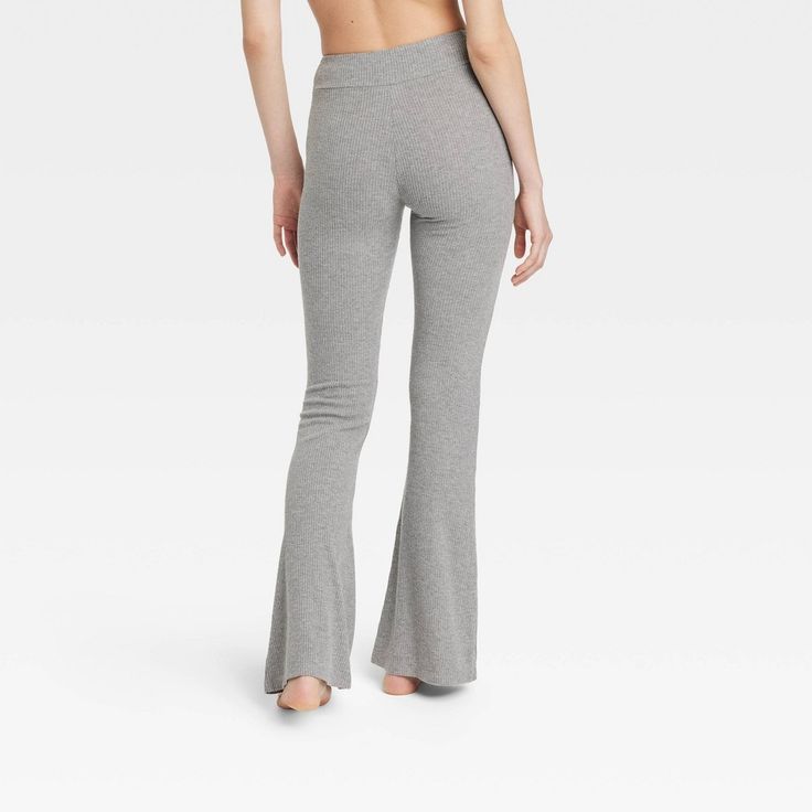 Update your sleepwear bottoms with these Cozy Ribbed Crossover Waistband Flared Legging Pajama Pants from Colsie™. These high-rise pajama leggings feature a cozy ribbed-textured finish and a flared cut with a casual fit. The crossover elastic waist offers a secure and easy pull-on fit, while the soft, stretchy material lends comfortable wear. Pair these pants with a comfy top and slippers for a complete look. Colsie™: All You, Inside and Out. Wide Leg Stretch Bottoms For Relaxation, Stretch Wide Leg Bottoms For Relaxation, Full Length Yoga Pants With Ribbed Waistband For Loungewear, Stretch Wide-leg Bottoms For Relaxation, Comfortable High Waist Sweatpants For Loungewear, Comfortable High-waist Sweatpants For Loungewear, High Waist Yoga Pants With Elastic Waistband For Loungewear, Stretch Wide Leg Yoga Pants For Loungewear, Full-length Yoga Pants With Elastic Waistband For Loungewear