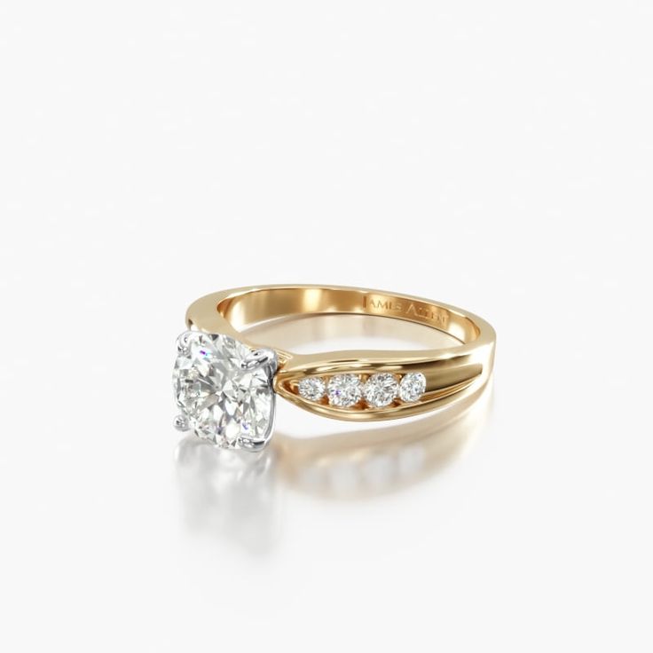 a diamond ring with three stones on the side