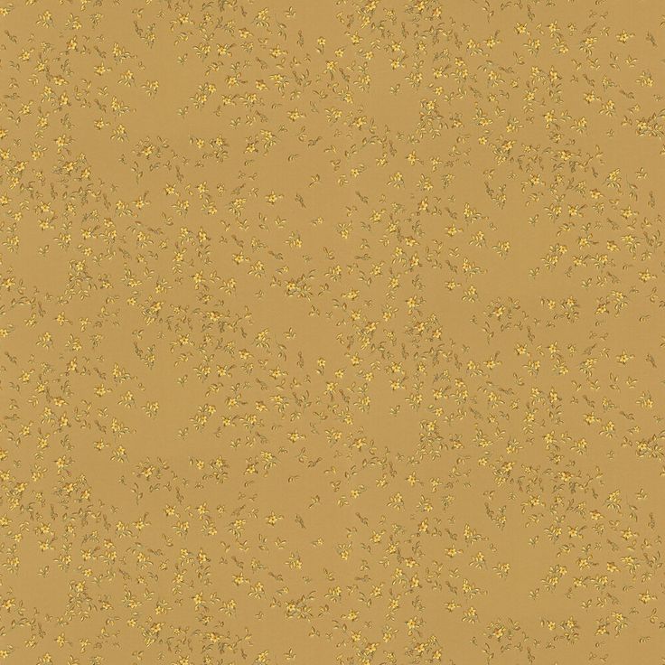 a brown background with small yellow speckles