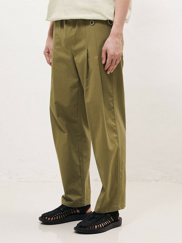 Editor's NotesLinen Two-Tuck Wide Banding Pants Khaki from FANACULT are pants made of linen cotton that are good for summer. Bio-washed.- 25% Linen, 75% Cotton- String at waist- Key ring detail- Pocket details- High quality seam allowanceMeasurements (in.)- Size: M / L / XL- Length: 40.1 / 40.5 / 40.9 in.- Waist: 14.9 / 16.5 / 18.8 in.- Thigh: 13.3 / 13.7 / 14.1 in.- Hip: 20.8 / 21.2 / 21.6 in.- Inseam: 31.8 / 31.8 / 31.8 in.- Hem: 9.0 / 9.4 / 9.8 in.*Model InformationHeight: 6'0 Weight: 149.9 Size: LComposition & Care- 25% Linen, 75% Cotton- Dry Clean OnlyDesigner- by FANACULT Olive Wide Leg Relaxed Fit Pants, Summer Cotton Straight Leg Chinos, Cotton Tapered Leg Chinos For Summer, Relaxed Cotton Trousers, Olive Bottoms With Elastic Waistband For Spring, Summer Cotton Chinos With Welt Pockets, Olive Pants For Summer Workwear, Relaxed Cotton Bottoms For Workwear, Summer Olive Workwear Bottoms