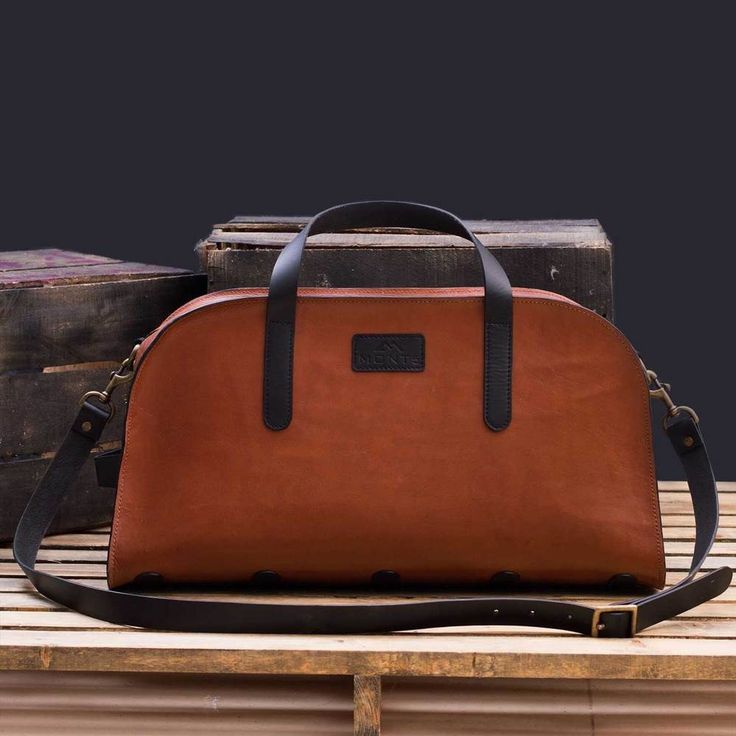 Leather Travel bag made from full grain vegetable tanned cowhide leather. Leather Carry On Bag, Hipster Bag, Leather Duffel Bag, Simple Eye, Leather Duffel, Raw Leather, Tan Cowhide, Mens Travel Bag, Travel Handbags