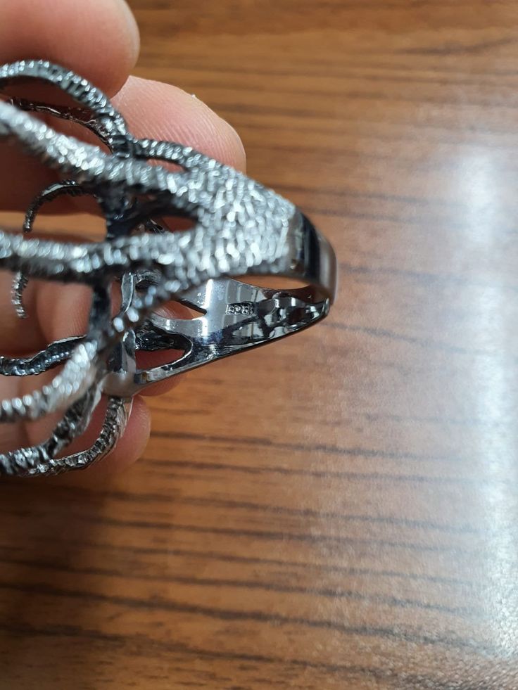 Material : Sterling Silver, 925 Silver Color: Oxidized Silver (Gunmetal Color) Quantity : 1pc Size: Adjustable Bezel size : adjustable approx. 35x25mm also Suitable for shapeless stones To see other all 925K Sterling Silver Ring please click below https://www.etsy.com/shop/AZsupplies?search_query=sterling+silver+ring+blank To see other all 925K Sterling Silver Pendant bezel please click below https://www.etsy.com/shop/AZsupplies?search_query=sterling+silver+pendant+blank To see other all 925K St Elegant Claw-shaped Metal Jewelry, Tarnish Resistant Silver Stainless Steel Rings, Halloween Jewelry Gift With Claw Shape, Halloween Gift Jewelry With Claw Shape, Halloween Claw-shaped Jewelry Gift, Gothic Claw Shaped Metal Rings, Halloween Silver Claw Jewelry, Silver Metal Jewelry With Claw Shape, Unique Metal Rings For Halloween