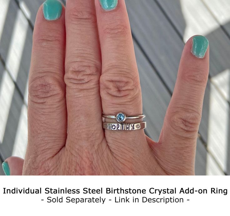 "PLEASE READ THE WHOLE DESCRIPTION BEFORE ORDERING - Custom orders are not returnable. This line of stainless steel rings (sizes 5-11) are hand stamped one metal stamp at a time using the name or initials of your choice (on the outside of the ring only)! Stamping pushes into the metal creating divots that are then filled with black paint. This is a different method than engraving. Since hand stamping is handmade, it won't be completely straight or some letters might be deeper than others; if tha Adjustable Nickel-free Stackable Rings For Gifts, Adjustable Stackable Stainless Steel Rings, Nickel Free Adjustable Stackable Rings For Promise, Nickel Free Adjustable Stackable Promise Rings, Nickel-free Adjustable Stackable Promise Rings, Nickel-free Adjustable Stackable Rings For Promise, Meaningful Stackable Promise Rings, Nickel-free Rings For Anniversary And Mother's Day, Adjustable Nickel-free Rings For Mother's Day