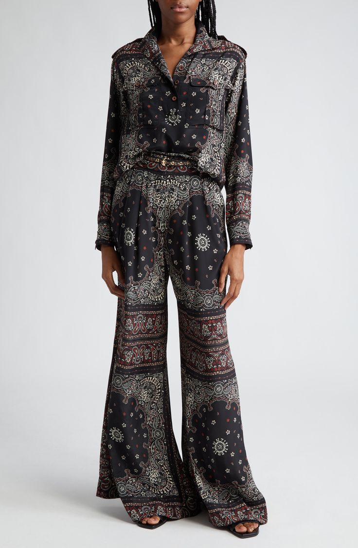 Covered with a bandana print incorporating the label's name, these silk-enriched belted pants push the swish factor off the charts with billowy, extrawide legs. 34 1/2" inseam; 46" leg opening; 13" front rise; 17" back rise (size 2US) Zip fly with hook-and-bar closure Front slant pockets Removable belt 70% viscose, 30% silk Dry clean Imported Designer Clothing Pleated Wide Leg Pants, Black Bandana, Belted Pants, Utility Pockets, Bandana Print, Pullover Shirt, Stand Collar, Leg Pants, Black Pants