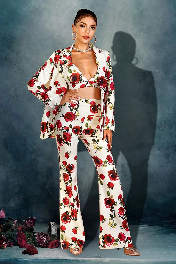 Radiate elegance in a floral pantsuit ensemble, a perfect blend of sophistication and femininity. Crafted with delicate detail to elevate your style, ideal for upscale gatherings and special occasions. Handmade customization Fabric composition: 90% polyester fiber, 10% spandex Washing method: hand wash or dry clean Popular elements: floral Elegant Two-piece Spring Suits, Two-piece Tailored Sets For Spring, Spring Tailored Two-piece Sets, Tailored Two-piece Sets For Spring, Tailored Two-piece Spring Sets, Spring Two-piece Formal Suit, Formal Two-piece Spring Suits, Chic V-neck Suits For Spring, Spring Fitted Two-piece Sets