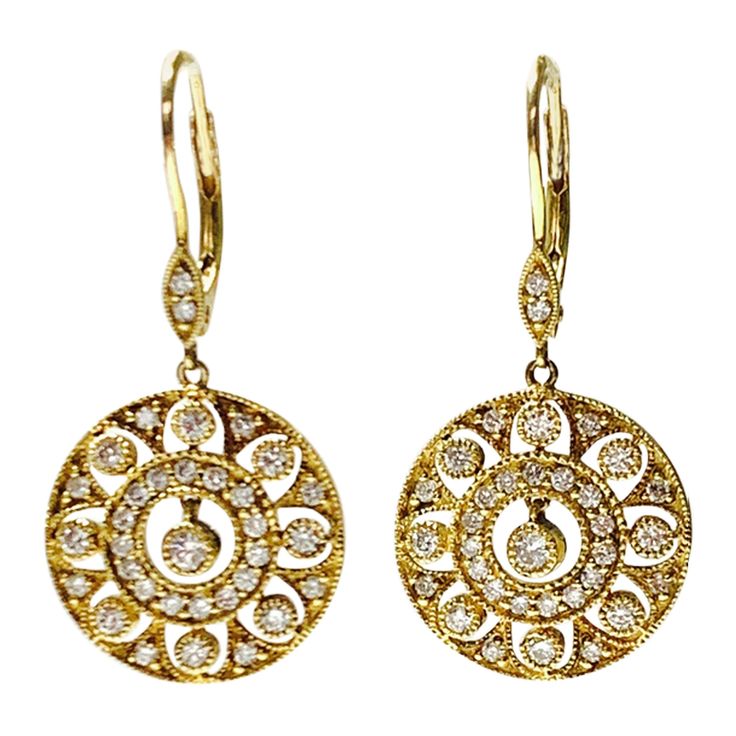 Diamond dangle earrings in 14k yellow gold. The details are as follows : Diamod weight : 1.20 carat ( GH color and VS clarity ) Measurements : length : 1.40 inch Metal : 14 K yellow gold Classic Yellow Gold Chandelier Earrings, Dazzling Diamond Pierced Earrings, Classic Brilliant Cut Chandelier Earrings For Anniversary, Formal Yellow Gold Diamond Chandelier Earrings, Classic Gold Earrings With Single Cut Diamonds, Formal Diamond Round Chandelier Earrings, Round Yellow Gold Diamond Pierced Earrings, Timeless Pierced Diamond Earrings, Dazzling Yellow Gold Diamond Earrings With Accents