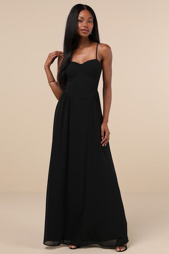 Forget dressing to the nines, because when you slip on the Lulus Exuding Excellence Black Sleeveless Bustier Maxi Dress you'll always be a ten! Airy woven chiffon shapes this event-ready dress that falls from adjustable spaghetti straps into a sweetheart neckline and a bustier-inspired bodice with seamed, lightly padded cups. Basque-style waist features light gathering at the sides as it continues into a cascading, A-line maxi skirt. Hidden back zipper/clasp. Fit: This garment fits true to size. Lulus Black Dress, Black Spaghetti Strap Dress, Dressed To The Nines, Adhesive Bra, Bustier Dress, The Nines, Sleeveless Maxi Dress, Black Sleeveless, Large Size Dresses