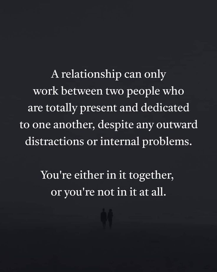 two people standing next to each other in the dark with text that reads, a relationship can only work between two people who are totally present