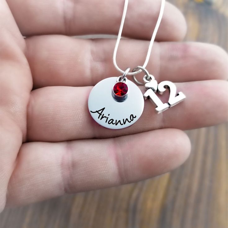 "12th Birthday Necklace, Gift for Girl Turning 12, Personalized Name Necklace with Birthstone, Gift for 12 Year Old, Little Girl Gift, Available in 16\", 18\" or 20\" necklace length. For other year necklaces click below: 10th - https://www.etsy.com/listing/849510629/10th-birthday-necklace-gift-for-girl 11th - https://www.etsy.com/listing/835614640/11th-birthday-necklace-gift-for-girl 12th - https://www.etsy.com/listing/849513451/12th-birthday-necklace-gift-for-girl 13th - https://www.etsy.com/l Birthstone Necklace For Birthday And Valentine's Day, Valentine's Day Birthday Birthstone Necklace, Mother's Day Birthday Charm Necklace With Lobster Clasp, Birthday Charm Necklace With Lobster Clasp, Adjustable Birthstone Necklace For Birthday And Mother's Day, Adjustable Charm Necklace For Birthday And Mother's Day, Adjustable Charm Necklaces For Birthday And Mother's Day, Adjustable Nickel-free Birthstone Necklace For Birthday, Adjustable Hypoallergenic Necklace For Birthday