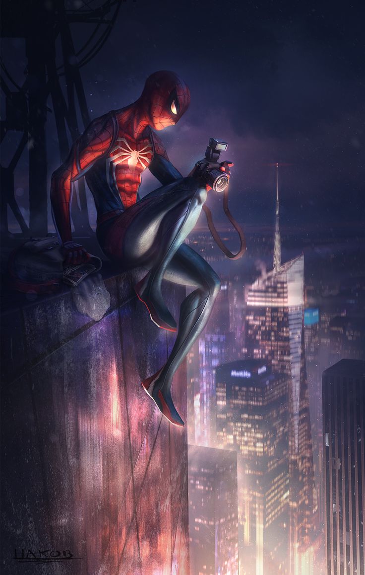 a spider man sitting on top of a tall building in the city at night with his legs crossed