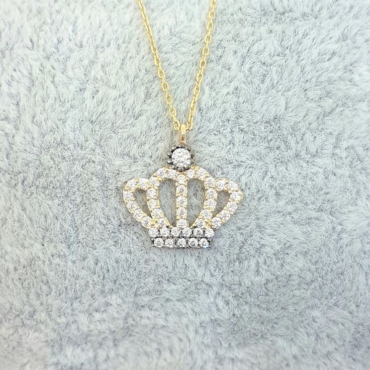 - Queen Crown Princess women jewelry necklace is made with high quality 14K real solid gold and as decorated with white zirconia stones - This charm, dainty, delicate and trendy the women jewelry pendant necklace has been artfully designed for timeless yet modern millennial fashion. - You receive the necklace in a beautiful and free gift box. - Free shipping (Arrive within 4 business days to USA and Canada ( 1 day for production+3 days for shipment)) - This necklace is a perfect and special gift Gold Queen Crown, Queen Necklace, Crown Pendant Necklace, Snowflake Bracelet, Crown Pendant, Queen Jewelry, Crown Necklace, Fine Gold Jewelry, Turquoise Stud Earrings