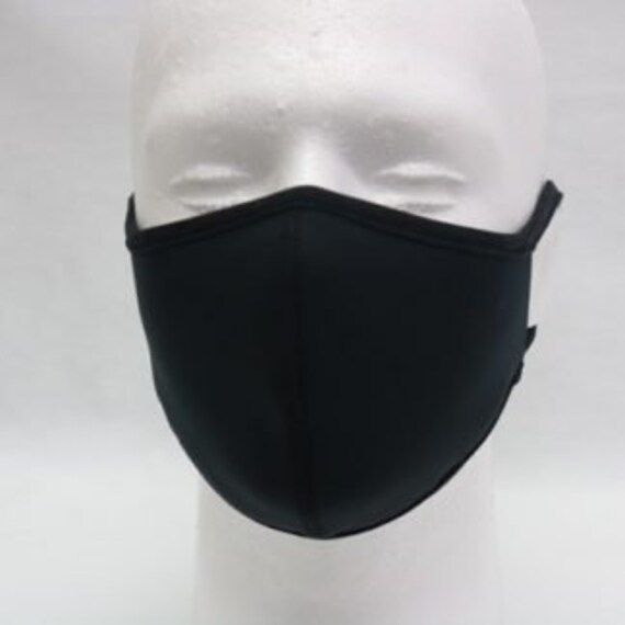 Our face mask is constructed with water repellent fabric and manufactured to the highest standards. The use of face masks has been proven to slow the spread of the virus and reduce risk of transmission. This mask should be used in addition to following CDC guidelines on hand washing and social distancing. Machine washable and dryer safe. Made in USA. Black Face Mask, Protective Clothing, Water Repellent Fabric, Social Distancing, Hand Washing, Water Repellent, Face Masks, Clothing Items, Face Mask