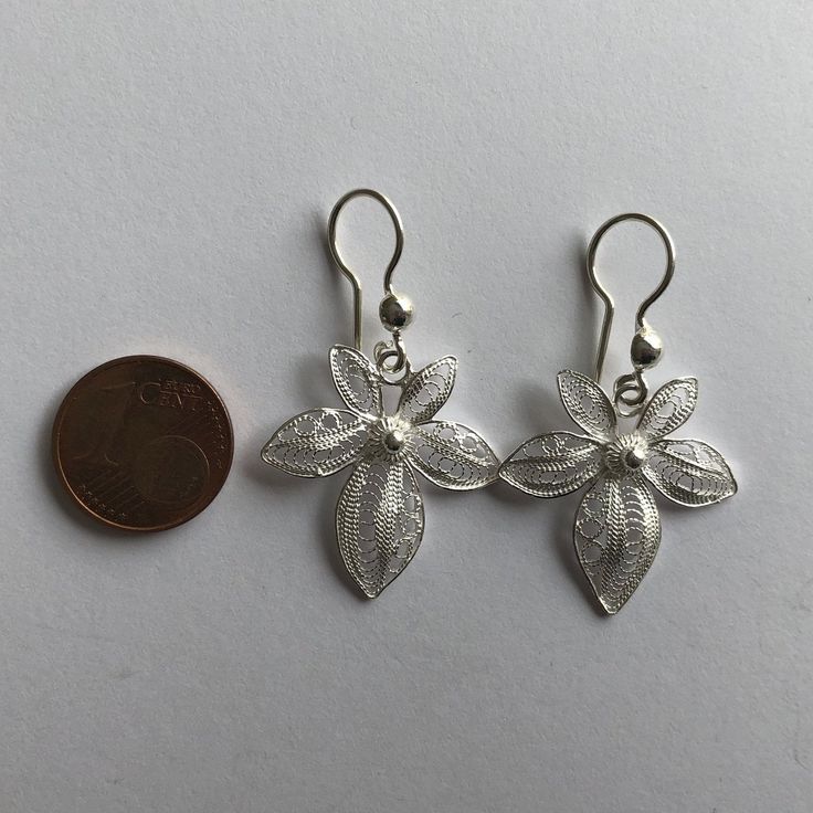 "Silver Earrings Orchids - Filigree Earrings - Filigree Jewelry - Women Earrings - Flower Earrings - Silver Dangle Earrings - Handmade Filigree - delicate jewellery technique made from silver or golden threads \"embroidering\" kind of metalwork lace that is specific to Spain, especially an Andalusian town Cordoba, where they call it a cordobese filigree. This craftsmanship has been passed from generation to generation, nonetheless nowadays there are very few craftsmen left who know to perform su Ornate White Pierced Earrings, Traditional White Flower Earrings, Ornate White Filigree Earrings, Filigree Flower Earrings, White Filigree Drop Earrings, Traditional Pierced Flower Shaped Earrings, Filigree Flower Drop Earrings, Traditional Flower-shaped Earrings With Ear Wire, Traditional Pierced Flower Jewelry