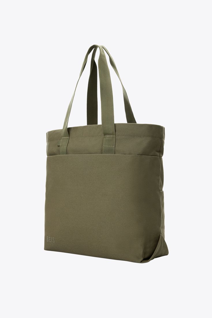 Simply put, this is the perfect everyday bag. Crafted from natural cotton, the Utility Tote combines the clean style of a classic tote bag with effortless function for when you need just a little bit more structure in your life (don’t we all?). Featuring a sleek and seriously timeless north south silhouette and our most-loved features like laptop storage, water bottle pockets, and more, this heavy duty tote is sure to be your new go-to. Pink Luggage, Black Luggage, Utility Tote Bag, Classic Tote Bag, Laptop Storage, Work Accessories, Utility Tote, Luggage Covers, Accessories Packing