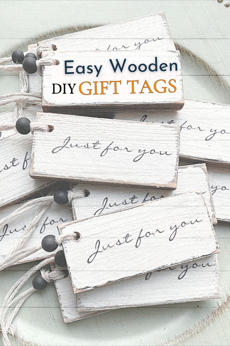 Rustic wooden gift tags that say Just for you with a white string and black bead Basket Tags Diy, Diy Christmas Gift Tags Wood, Wood Gift Tag Ideas, Cardboard Tags Ideas, Wood Christmas Tags Diy Ornaments, Christmas Wood Tags Diy, Diy Wooden Gift Tags, Painted Wooden Gift Tags, Diy Wooden Tags