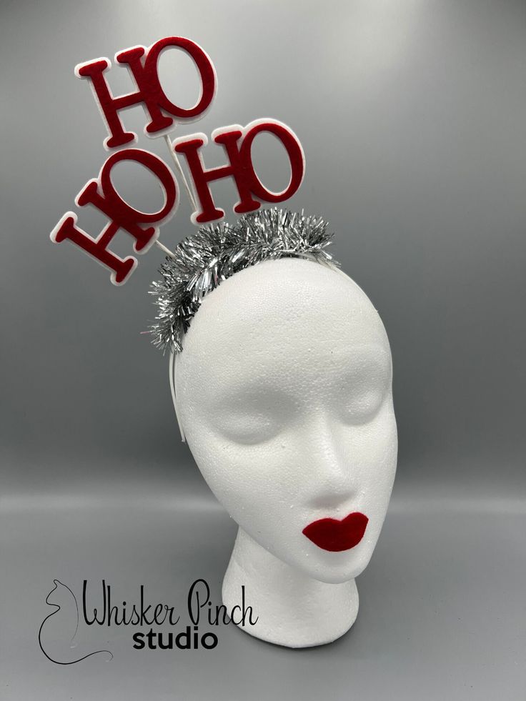 This one-of-a-kind Ho Ho Ho Holiday headband will be sure to add a funky, festive flair to any Christmas ensemble! Make a statement at your Holiday gatherings!  Add a fun, red and white felt Ho Ho Ho fascinator with silver tinsel trim to your outfit.  It is a great way to stand out from the crowd, turn heads and get tons of compliments!   This design looks fantastic from the front and back and is lightweight and comfortable to wear.   Every headband is 100% hand-made and like a snowflake, no two Carnival Headband As Gift, Carnival Headband Headpieces For Gift, Carnival Headband Headpiece As Gift, Carnival Gift Headband Headpiece, Whimsical Christmas Party Headband, Holiday Headband Gift, Red Headband For Carnival Party, Fun Red Mini Hats For Party, Carnival Red Party Headband