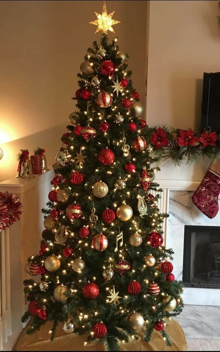 a christmas tree with red and gold ornaments