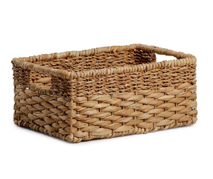 a woven basket on a white background