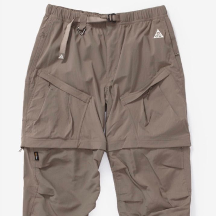 Nike Acg Smith Summit Cargo Pants Shorts Olive Brown Size Xl Or Xxl Dn3943-040 Nwt Outdoor Khaki Pants With Built-in Shorts, Utility Pants With Built-in Shorts For Outdoor, Utility Pants With Built-in Shorts For Outdoor Activities, Khaki Hiking Bottoms With Functional Pockets, Khaki Outdoor Pants With Built-in Shorts, Khaki Short Pants For Outdoor Activities, Utility Long Pants For Hiking, Hiking Bottoms With Side Pockets, Baggy Bottoms With Functional Pockets For Outdoor