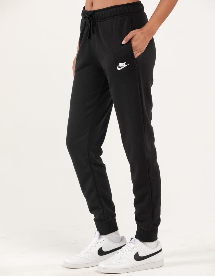 NIKE Sportswear Club Womens Fleece Sweatpants - BLACK | Tillys Nike Fleece Leisure Bottoms, Nike Fleece Bottoms For Leisure, Sporty Nike Joggers For Leisure, Nike Fleece Joggers For Leisure, Nike Sporty Joggers For Leisure, Nike Fleece Bottoms With Elastic Waistband, Nike Fleece Activewear With Elastic Waistband, Nike Fleece Bottoms With Ribbed Waistband, Nike Workout Bottoms With Ribbed Waistband