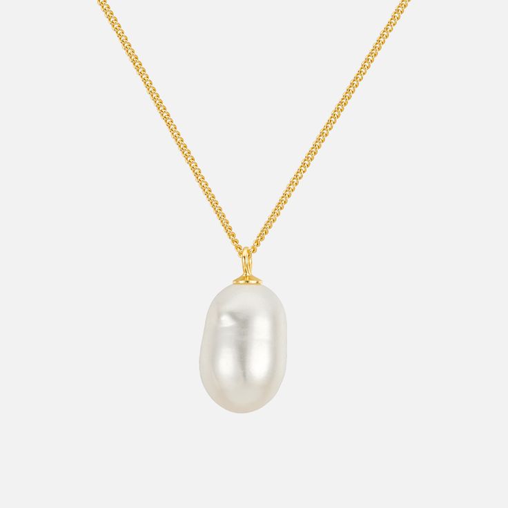 Look no further for an elegant, timeless classic. This Essa Pearl Pendant Necklace showcases a perfectly imperfect freshwater pearl, guaranteed to bring any ensemble to the next level. An effortless piece that will never go out of style! Details: Gold: 925 Sterling Silver, 18K Gold Plated, Freshwater Pearl Silver: 925 Sterling Silver, Rhodium Plated, Freshwater Pearl Pearl Size: 12.5mm - 13.5mm Classic Gold Pearl Necklace, Classic Round Pearl Necklace For Everyday, Classic Everyday Round Pearl Necklace, Classic Pearl Necklace With Baroque Pearl Chain, Classic Pearl Charm Necklace For Everyday, Classic Everyday Necklace With Pearl Charm, Classic Baroque Pearl Necklace With Pearl Charm, Classic Baroque Pearl Necklace With Pearl Chain, Classic Pearl White Necklaces For Everyday