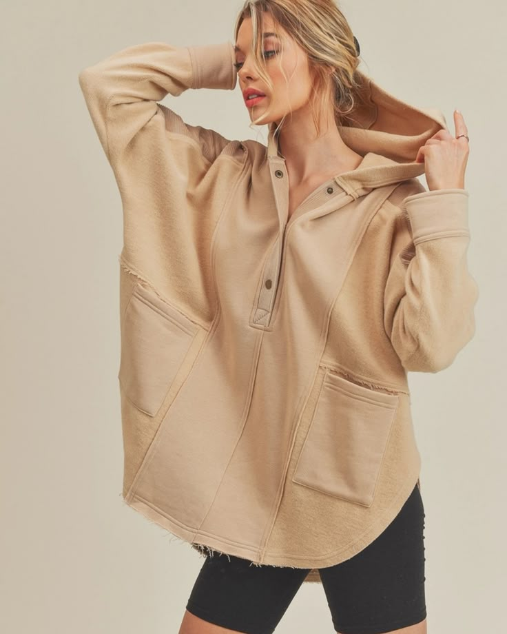 This french terry hoodie is an effortless essential for any activity. Fit: Picture an oversized henley fit that falls below your hips. Like wearing your happy place- spacious, warm and oh-so-cozy. Features: Contrast corduroy panels, snap-up neckline, split hem for ultimate comfort, and front pockets. Why You'll <3 It: This easy hoodie is your go-to for every mood and moment. Perfect to throw on pre or post workout. It's also the equivalent of a cozy blanket for those lazy Sunday afternoons.