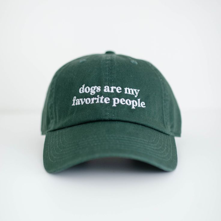 Features: Professional machine embroidery 'Dogs are my favorite people' lettering design 6 panel designed hat for a low-profile lightweight fit 100% Cotton One size fits most, adjustable strap back with buckle Green Dad Hat With Letter Print, Green Letter Print Dad Hat, Green Dad Hat With Letter Print And Adjustable Fit, Green Adjustable Dad Hat With Letter Print, Adjustable Green Dad Hat With Letter Print, Adjustable Baseball Cap With Embroidered Text, Adjustable Dad Hat With Embroidered Text, Adjustable Dad Hat With Embroidered Text And Curved Brim, Adjustable Hats With Embroidered Text And Curved Brim