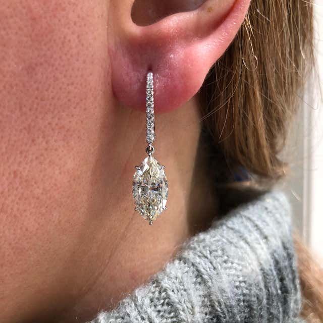 For Sale on 1stDibs - Each earring showcases a marquise cut diamond set in an elegant drop. Suspended on an accented lever-back made in 18 karat white gold. Marquise diamonds Sterling Silver Drop Earrings, Moissanite Earrings, Marquise Cut Diamond, Marquise Diamond, Diamond Drops, Diamond Set, Diamond Drop Earrings, Drop Earring, Silver Drop Earrings