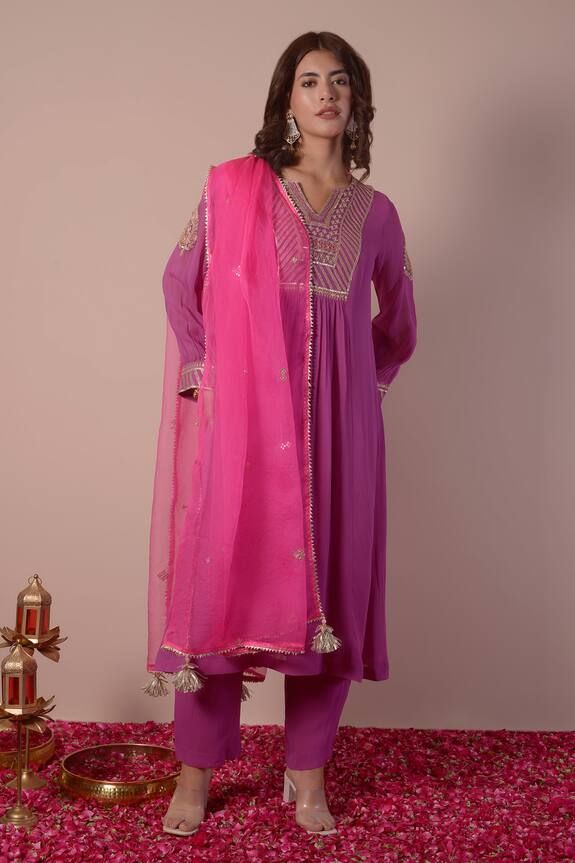 Orchid purple kurta with gota patti, thread, sequin embroidery on yoke in stripe pattern. Paired with palazzo and pink dupatta. - Aza Fashions Semi-stitched Purple Georgette Palazzo Set, Bollywood Purple Palazzo Set With Resham Embroidery, Purple Bollywood Palazzo Set With Resham Embroidery, Festive Purple Unstitched Suit With Resham Embroidery, Designer Bollywood Style Purple Palazzo Set, Festive Purple Palazzo Set With Zari Work, Bollywood Style Designer Purple Palazzo Set, Purple Bollywood Designer Wear Palazzo Set, Festive Purple Palazzo Set With Long Sleeves