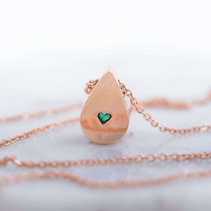 Fabulous, elegant and subtle 14k gold necklace with beautiful green emerald . The emerald gemstone is natural, Earth mined. It comes from Colombia. This emerald necklace is one of a kind. You are buying the necklace which is pictured. In the back of the gold necklace- tiny heart- symbol of LOVE This emeral necklace may be a perfect gift for her for birhtday, anniversary, Christmas, graduation or any other occasion. Central stone: *natural, pear shaped, Earth mined emerald - beautiful green color Formal Drop Emerald Necklace, Drop Emerald Necklaces For Formal Occasions, Emerald Drop Necklace For Formal Occasions, Heart Shaped Emerald Necklace As A Gift, Heart-shaped Emerald Necklaces As A Gift, Heart-shaped Emerald Necklace As A Gift, Heart-shaped Emerald Necklace For Gift, Emerald Teardrop Pendant Necklace For Anniversary, Green Heart-shaped Emerald Necklace For Gift