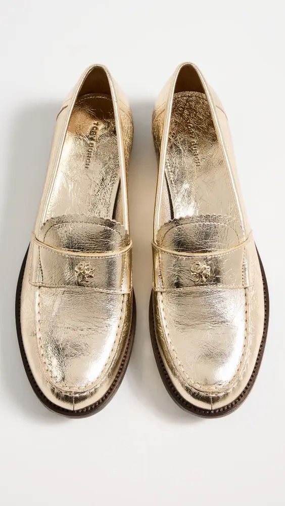 Tory Burch Classic Loafers | Shopbop Timeless Italian Loafers With Round Toe, Gold Loafers With Leather Sole For Business, Gold Loafers With Leather Sole And Calf Leather, Gold Calf Leather Loafers With Leather Sole, Luxury Closed Toe Loafers For Galas, Gold Formal Loafers With Branded Insole, Timeless Loafers With Textured Sole And Round Toe, Classic Gold Leather Loafers, Luxury Loafers With Leather Footbed And Round Toe