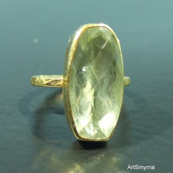 ARTSMYRNA METAL: 925k Silver GEM: Green Amethyst Diameter Stone Size: 18x10 mm COATING: 24k gold over (We can made a special type of coating for your personal preference ) MATERIEL : 925K Sterling Silver ( Some of my items vermeil gold over silver for looks rich . But i can finish in silver too ) Benefits: It is effective against skin diseases. Since it is an energetic stone, it has an enlivening effect on most people. So you can be sure you will receive only positive energy. It is beneficial ag Green Amethyst Ring Gift, Green Amethyst Ring In Sterling Silver, Luxury Green Amethyst Multi-stone Ring, Green Multi-stone Amethyst Ring Gift, Stackable Engagement Ring, Vintage Silver-toned Amethyst Ring Gift, Hammered Gold Ring, Birthday Gift Ring, Green Ring