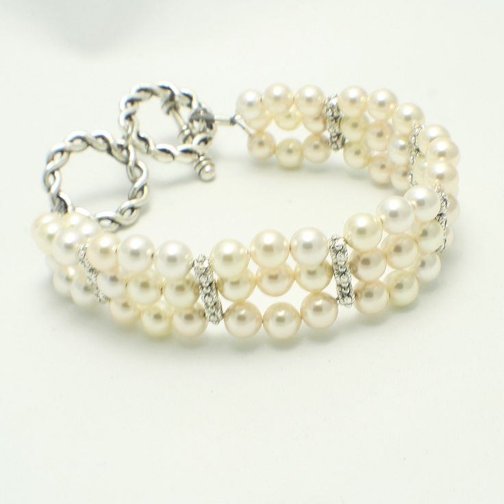 Cream Pearl Multi strand bracelet - Bridal - Formal - Holiday - Swarvoski Pearl - Wedding - Holiday Gift Formal Pearl Beaded Bracelets With Pearl Chain, Formal Pearl White Beaded Bracelets With Pearl Chain, Formal Pearl Embellished Bracelet Jewelry, Formal Pearl Embellished Bracelet, Elegant Pearl Bracelet For Formal Occasions, Elegant Adjustable Cuff Bracelet, Formal Pearl Beaded Bracelets, Elegant Adjustable Cuff Bracelet With Jubilee Design, Formal Pearl Beaded Bracelet