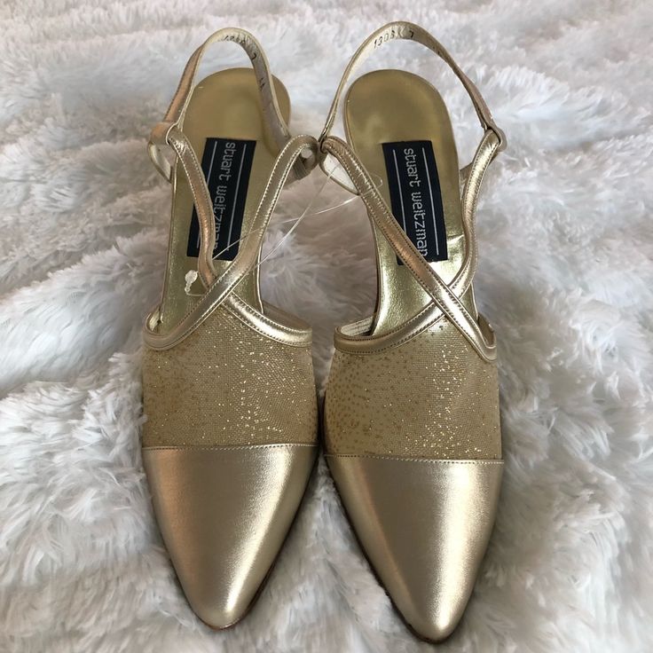 Brand New, Never Worn Stuart Weitzman Slingback Heels. Beautiful Gold Color With Some Sheer Covering With Gold Shimmer. Very Sophisticated Shoes For Evening Wear Or That Special Occasion. Heel Is 2” Size: 7 Aa Elegant Closed Toe Slingback Pumps With 4-inch Heel, Elegant 4-inch Kitten Heels For Evening, Formal Low Heel Kitten Heels With Wrapped Heel, Formal Kitten Heels With Wrapped Low Heel, Formal Kitten Heels With Wrapped Heel, Fitted Slingback Pumps With 4-inch Heel For Gala, Medium Width High Heel Slingback Pumps For Party, Party Slingback Pumps With Ankle Strap, Slingback Pumps With 4-inch Heel For Evening