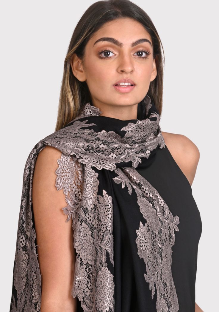 This black scarf is an all time classic with a little bling. Woven from a fine silk and wool blend, it features a contrasting Antique Silver floral lace border making for the perfect any time wear accessory whilst keeping you comfortably warm. For a casual or formal look, this is a must-have in every woman's wardrobe. Black Scarf, Lace Border, Formal Looks, Women's Wardrobe, Wool Scarf, Black Silk, Every Woman, All Time, Floral Lace