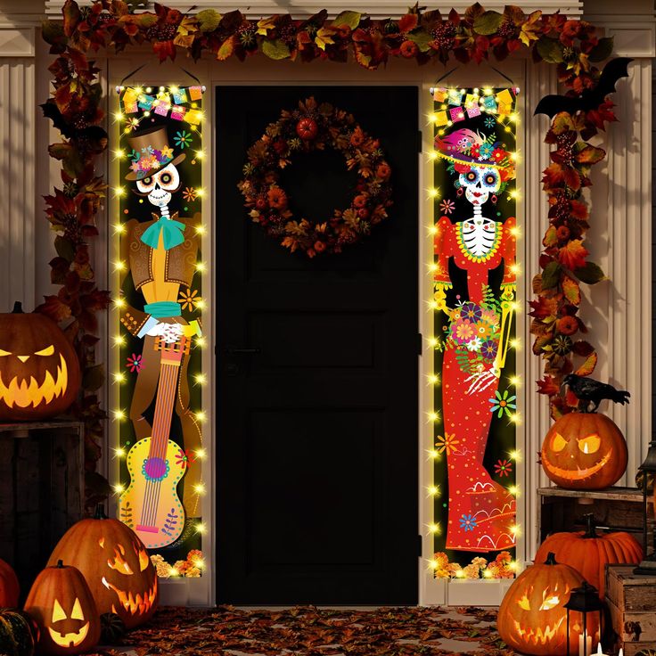 halloween decorations and pumpkins are on display outside the front door with skeletons, jack - o'- lanterns and wreaths