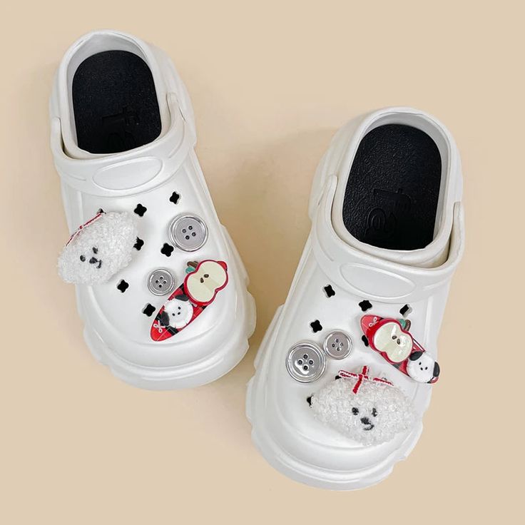 **These shoes are a LIMITED EDITION. Once sold out, they will NOT be restocked!** Features: Get Summer ready with our Sweet Puppy Chunky Slip on Outdoor Clogs! Made with ultra thick and comfy EVA foam to give you the softest steps. Comes with the CUTEST detachable charms, so you can dress up or dress down these clogs to whatever your feet desire. Whether you're out running errands or just hanging out with friends, our shoes will help you look and feel your best. Upgrade your shoe game today! Mad Trendy Non-slip Clogs With Round Toe, Trendy White Platform Slippers With Round Toe, Trendy White Round Toe Platform Slippers, Casual Platform Slippers With Thick Sole And Round Toe, Casual Platform Slippers With Thick Bottom And Round Toe, Platform Clogs With Round Toe For Streetwear, Platform Synthetic Clogs For Streetwear, Platform Round Toe Clogs For Streetwear, Round Toe Platform Clogs For Streetwear