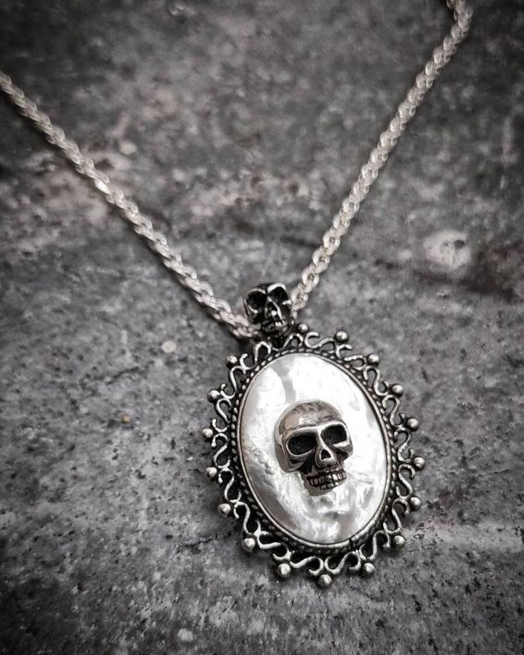 "Victorian Skull White Opal Steampunk Gothic Oxidized Sterling Silver 925 Pendant Necklace on Chain Our beautiful Gothic White Opal Skull Necklace is the perfect finishing touch to your gothic wedding gown. White Opal Skull Gothic pendant will be a hit with your horror-loving friends or anyone who loved a more dark style of jewelry. This is an excellent unique gift for anyone who enjoys Skulls, Halloween, Rockabilly style, Gothic Style, or unique horror artwork. This necklace can be worn with an Punk Style Engraved Jewelry Gift, Punk Style Engraved Necklace For Gift, Gothic Sterling Silver Chain Jewelry, Nickel-free Punk Style Pendant Jewelry, Nickel-free Punk Pendant Jewelry, Gothic Sterling Silver Chain Necklace, Gothic Sterling Silver Necklace With Silver Chain, Gothic Silver Necklace With Round Pendant, Silver Gothic Round Pendant Necklace