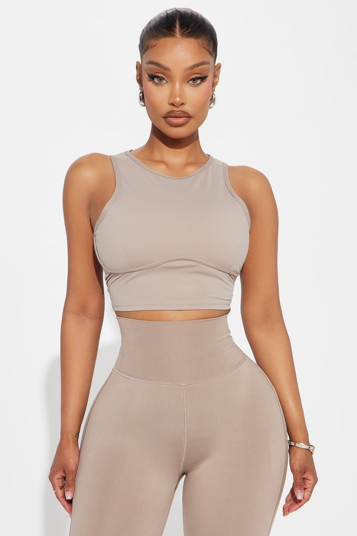 Available In Sage And Taupe. Super Soft Active Top Sleeveless High Neckline Underbust Binding Back Cut Out Ruching Back Tie Pair with "Pilates Girl Active Flare Pant" 75% Nylon 25% Spandex Imported | Pilates Girl Active Top in Taupe size 2X by Fashion Nova Pilates Girl, Taupe Fashion, Active Top, Flare Pant, Service Women, Jeans Jumpsuit, Top Sleeveless, Matching Dresses, High Neckline