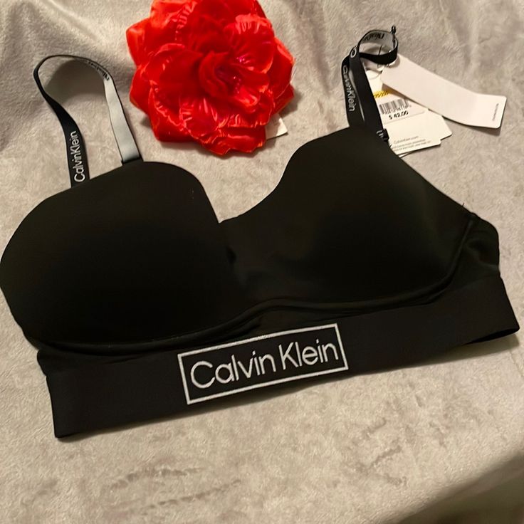 Calvin Klein Women's Ck One Cotton Lightly Lined Bralette With 3 Row Hook & Eye. Size - M, Color Black *** New Wt *** Calvin Klein Set Aesthetic, Underwire Fitted Sports Bra, Fitted Padded Sports Bra, Trendy Black Sports Bra For Spring, Black Sports Bra With Built-in Bra For Spring, Fitted Underwire Black Sports Bra, Black Fitted Underwire Sports Bra, Fitted Black Underwire Sports Bra, Black Seamless Sports Bra For Spring