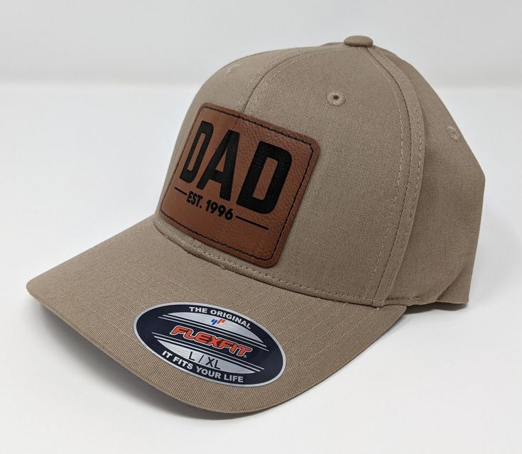 Looking for unique personalized gifts? Our personalized Flexfit Fitted hats for men combine style and sentiment, making them the ideal choice for Father's Day, birthdays, holidays, or special occasions. Each hat is custom-designed with your choice of name, initials, logo, unique message or design, creating a one-of-a-kind gift he'll love to wear. Thoughtful and practical, these hats are the ultimate personalized gifts for the men in your life. Handmade in the USA! Leather Patch is located in cen Father's Day Brown Snapback Hat With Flat Bill, Adjustable Snapback Hat With Curved Brim For Father's Day, Father's Day Brown Flat Bill Snapback Hat, Brown Adjustable Hat With Curved Bill, Father's Day Brown Curved Brim Hat, Brown Adjustable Curved Bill Hat, Adjustable Trucker Hat With Curved Brim For Father's Day, Father's Day Snapback Hat With Curved Brim, Father's Day Baseball Cap With Curved Brim