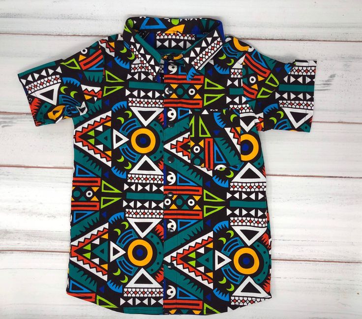 African print Dress shirt.  This list is only for the shirt, complete outfit are available in our shop in many otger prints. Multicolor Cotton Shirt For Playtime, Multicolor Shirt With Graphic Print For Playtime, Multicolor Summer Shirt For Playtime, Multicolor Graphic Print Shirt For Playtime, Fun Multicolor Printed Shirt, Ankara Shirt, Printed Dress Shirts, African Children, African Textiles